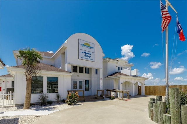 exterior space with fence and driveway