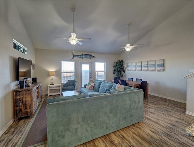 living room with ceiling fan, dark hardwood / wood-style floors, and lofted ceiling