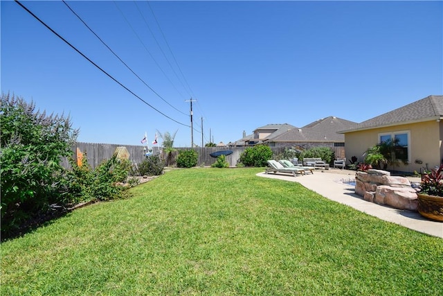 view of yard with a patio