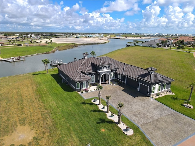 birds eye view of property featuring a water view