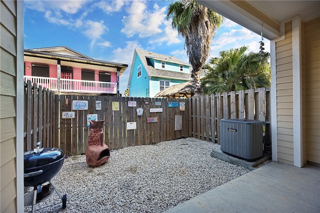 view of yard with central air condition unit