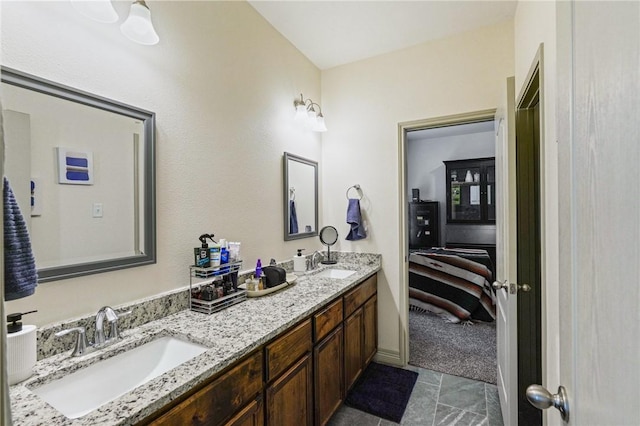 3137 Piranha Dr, Corpus Christi, TX 78414 - bathroom featuring double vanity and connected bathroom