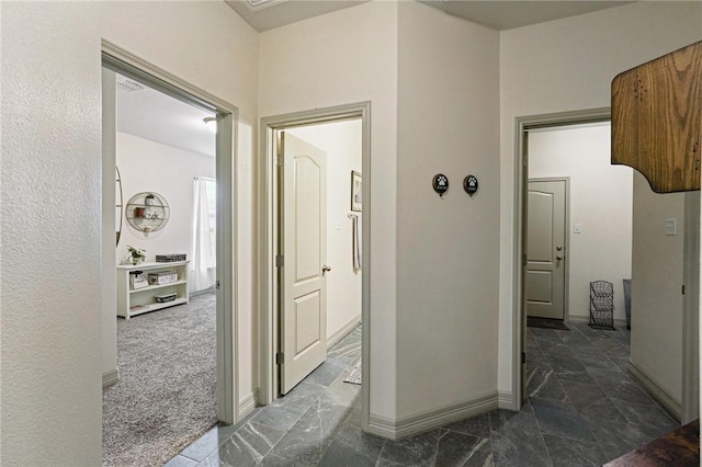 3137 Piranha Dr, Corpus Christi, TX 78414 - hall featuring baseboards and dark carpet