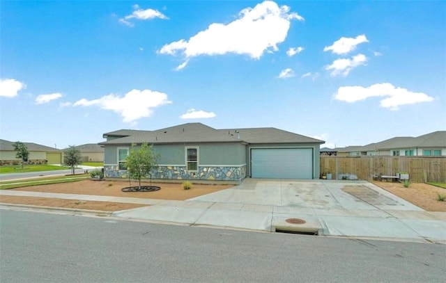 3137 Piranha Dr, Corpus Christi, TX 78414 - single story home featuring a garage, concrete driveway, and stucco siding