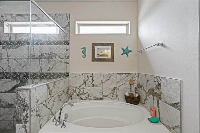 3137 Piranha Dr, Corpus Christi, TX 78414 - full bathroom featuring a garden tub and tiled shower