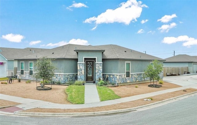 3137 Piranha Dr, Corpus Christi, TX 78414 - view of front of home with stone siding and stucco siding