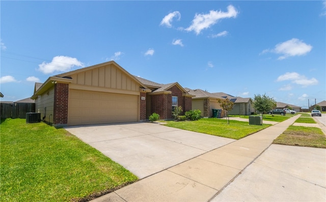 7525 Killebrew Dr, Corpus Christi, TX 78414 - ranch-style home with brick siding, a garage, concrete driveway, board and batten siding, and a residential view