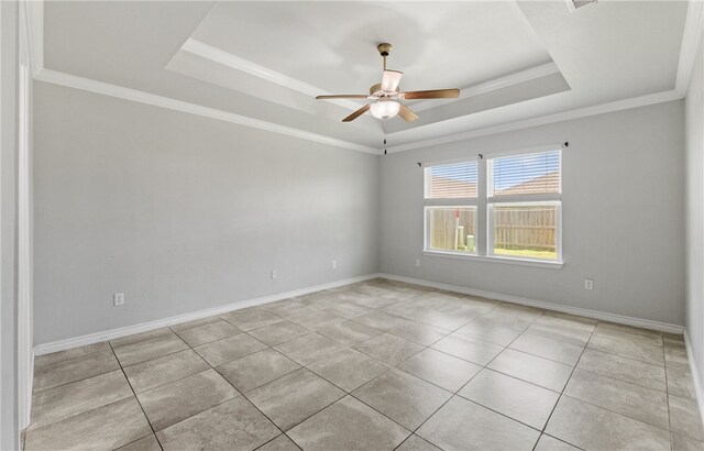 7525 Killebrew Dr, Corpus Christi, TX 78414 - empty room featuring a tray ceiling, light tile patterned floors, a ceiling fan, and ornamental molding