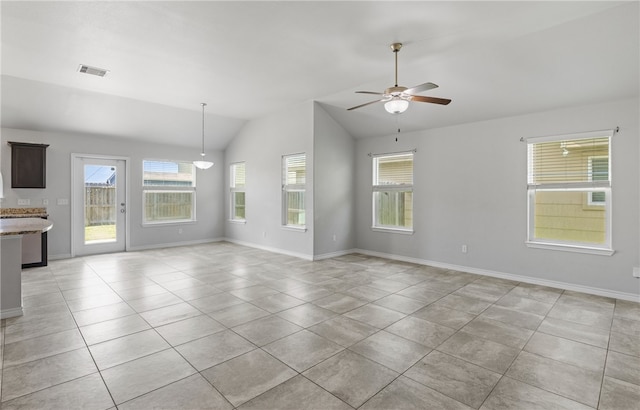 7525 Killebrew Dr, Corpus Christi, TX 78414 - unfurnished living room featuring a ceiling fan, lofted ceiling, and light tile patterned flooring