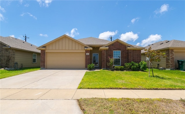 7525 Killebrew Dr, Corpus Christi, TX 78414 - single story home with board and batten siding, brick siding, an attached garage, a front lawn, and concrete driveway