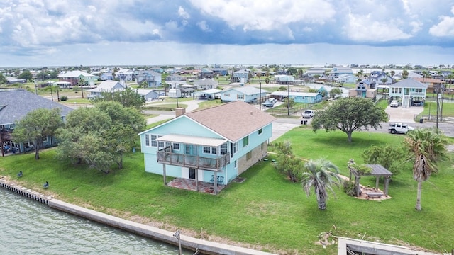 drone / aerial view featuring a water view