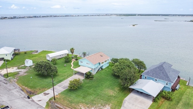 drone / aerial view with a water view