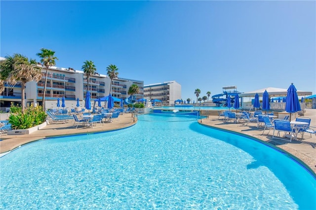 community pool with a patio
