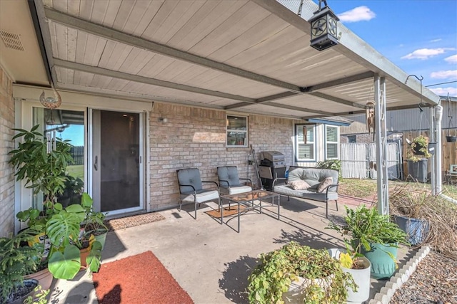 view of patio / terrace with an outdoor hangout area and area for grilling