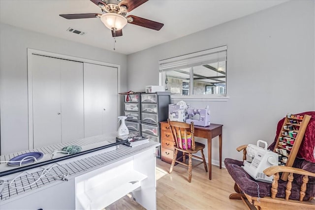 office area featuring ceiling fan and light hardwood / wood-style floors