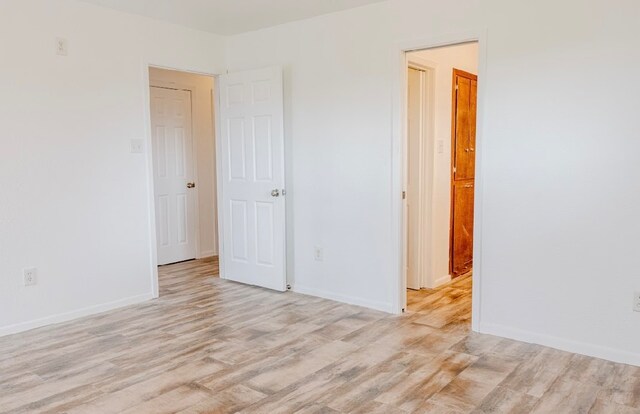 empty room featuring light hardwood / wood-style floors