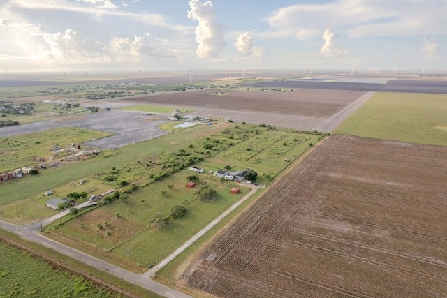 birds eye view of property with a rural view