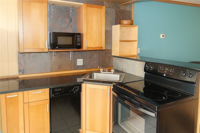 14300 S Padre Island Dr Unit 79, Corpus Christi, TX 78418 - kitchen featuring black appliances, light brown cabinets, and dark countertops