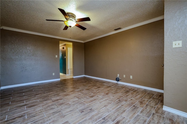 empty room featuring crown molding, light hardwood / wood-style flooring, ceiling fan, and a textured ceiling