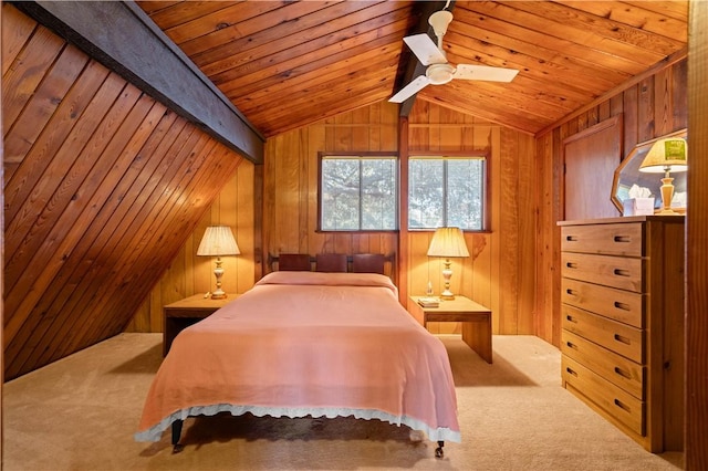 bedroom featuring carpet floors, vaulted ceiling with beams, wooden ceiling, and wooden walls