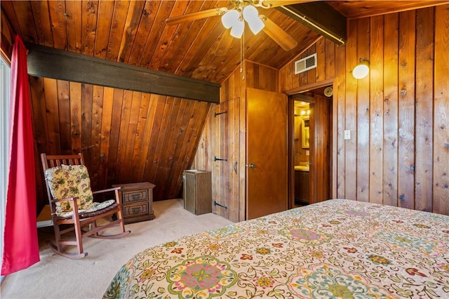 bedroom featuring carpet floors, vaulted ceiling with beams, wood ceiling, and wooden walls