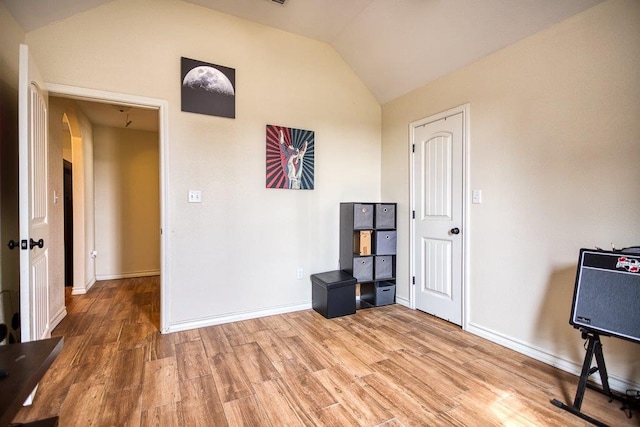 2421 Country Oaks Cir, Ingleside, TX 78362 - office featuring lofted ceiling, light wood-type flooring, and baseboards