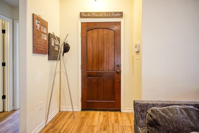 2421 Country Oaks Cir, Ingleside, TX 78362 - entryway with wood finished floors and baseboards