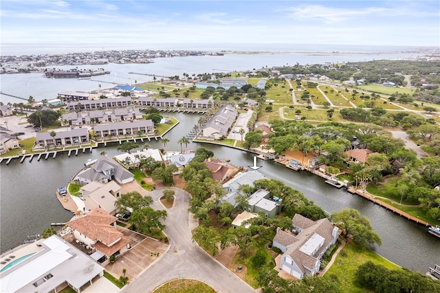 bird's eye view with a water view and a residential view
