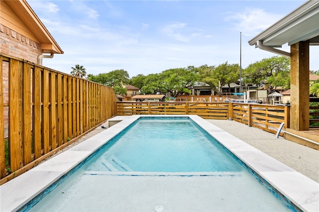 view of pool with a fenced in pool and a fenced backyard