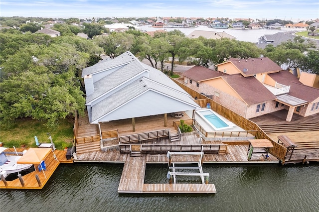 dock area with a water view and a residential view