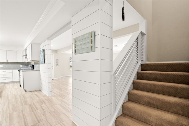 stairs featuring baseboards