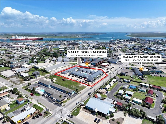 129 N Alister St Unit 2, Port Aransas, TX 78373 - aerial overview of property's location featuring a large body of water and property parcel outlined