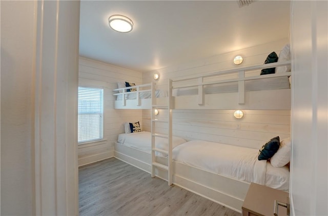 129 N Alister St Unit 2, Port Aransas, TX 78373 - bedroom featuring wood finished floors and baseboards