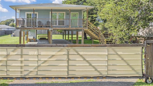 view of gate featuring a porch