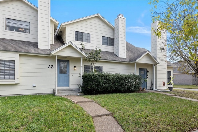 view of front of house with a front yard