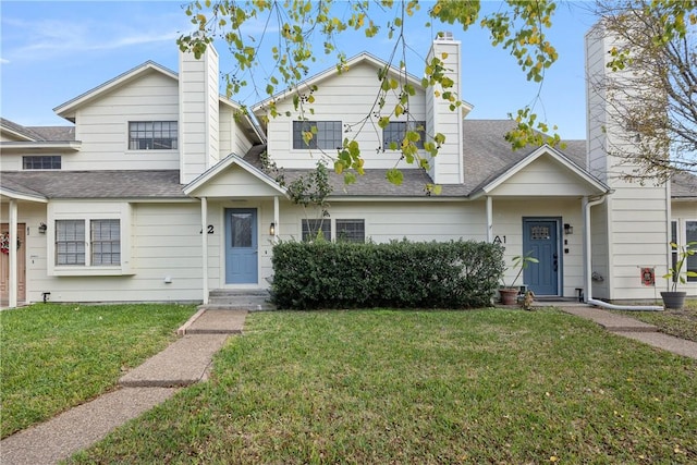 view of front facade with a front yard