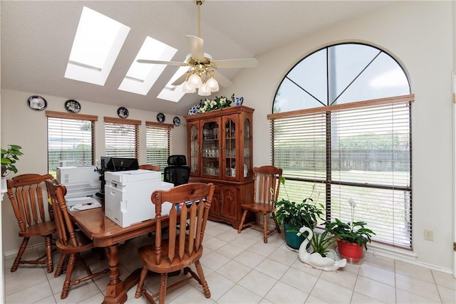 7153 Brookedge Ln, Corpus Christi, TX 78414 - dining room with lofted ceiling, a skylight, ceiling fan, an office area, and light tile patterned floors