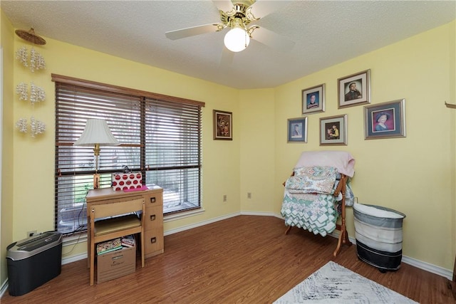 7153 Brookedge Ln, Corpus Christi, TX 78414 - living area with baseboards, wood finished floors, and a ceiling fan