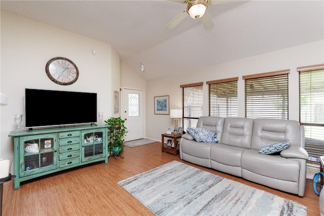 7153 Brookedge Ln, Corpus Christi, TX 78414 - living room with lofted ceiling, light wood-type flooring, and a ceiling fan