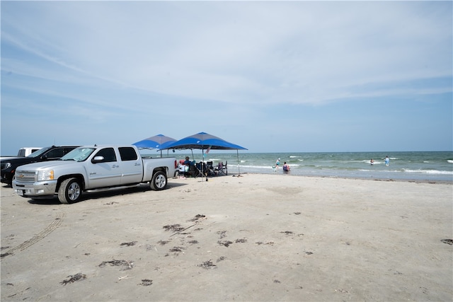 water view featuring a beach view