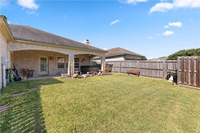 view of yard with a patio and a fenced backyard