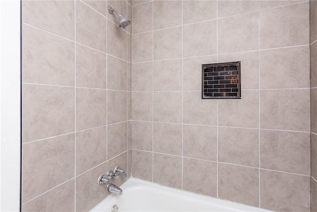 bathroom with shower / washtub combination