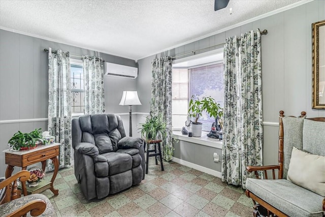 1032 Illinois St, Robstown, TX 78380 - sitting room with a wall unit AC, plenty of natural light, crown molding, tile patterned floors, and a ceiling fan