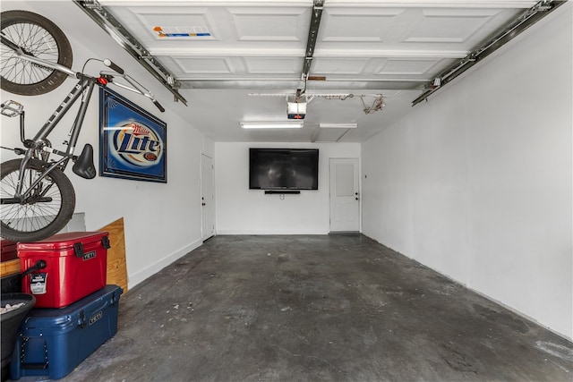 garage featuring a garage door opener