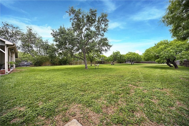 view of yard with fence