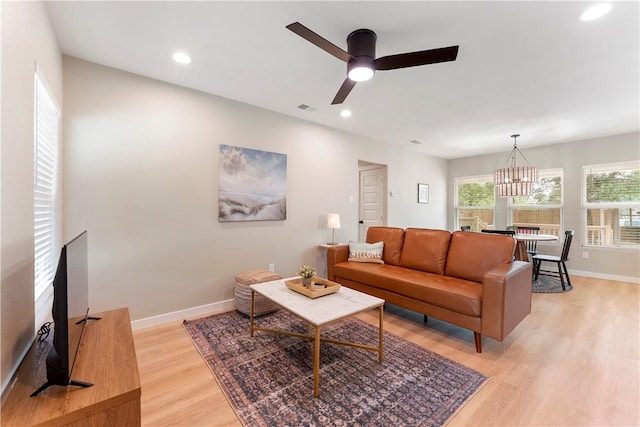 1233 Brentwood Dr, Corpus Christi, TX 78404 - living area featuring light wood-type flooring, baseboards, a chandelier, a ceiling fan, and recessed lighting