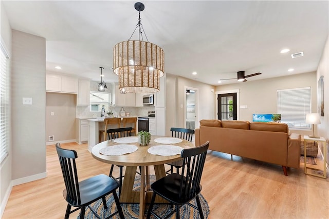 1233 Brentwood Dr, Corpus Christi, TX 78404 - dining area with light wood-type flooring, plenty of natural light, baseboards, recessed lighting, and a ceiling fan