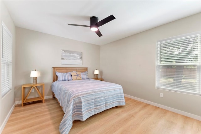 1233 Brentwood Dr, Corpus Christi, TX 78404 - bedroom featuring light wood-type flooring, baseboards, and ceiling fan