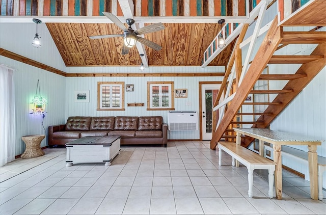 living room with high vaulted ceiling, light tile patterned floors, and ceiling fan