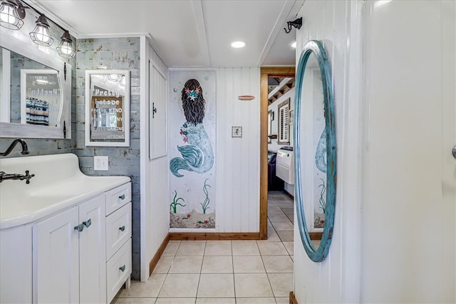 bathroom with tile patterned flooring and vanity